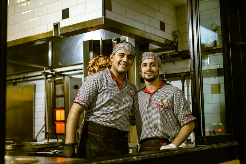 Chopt restaurant team member smiling in uniform